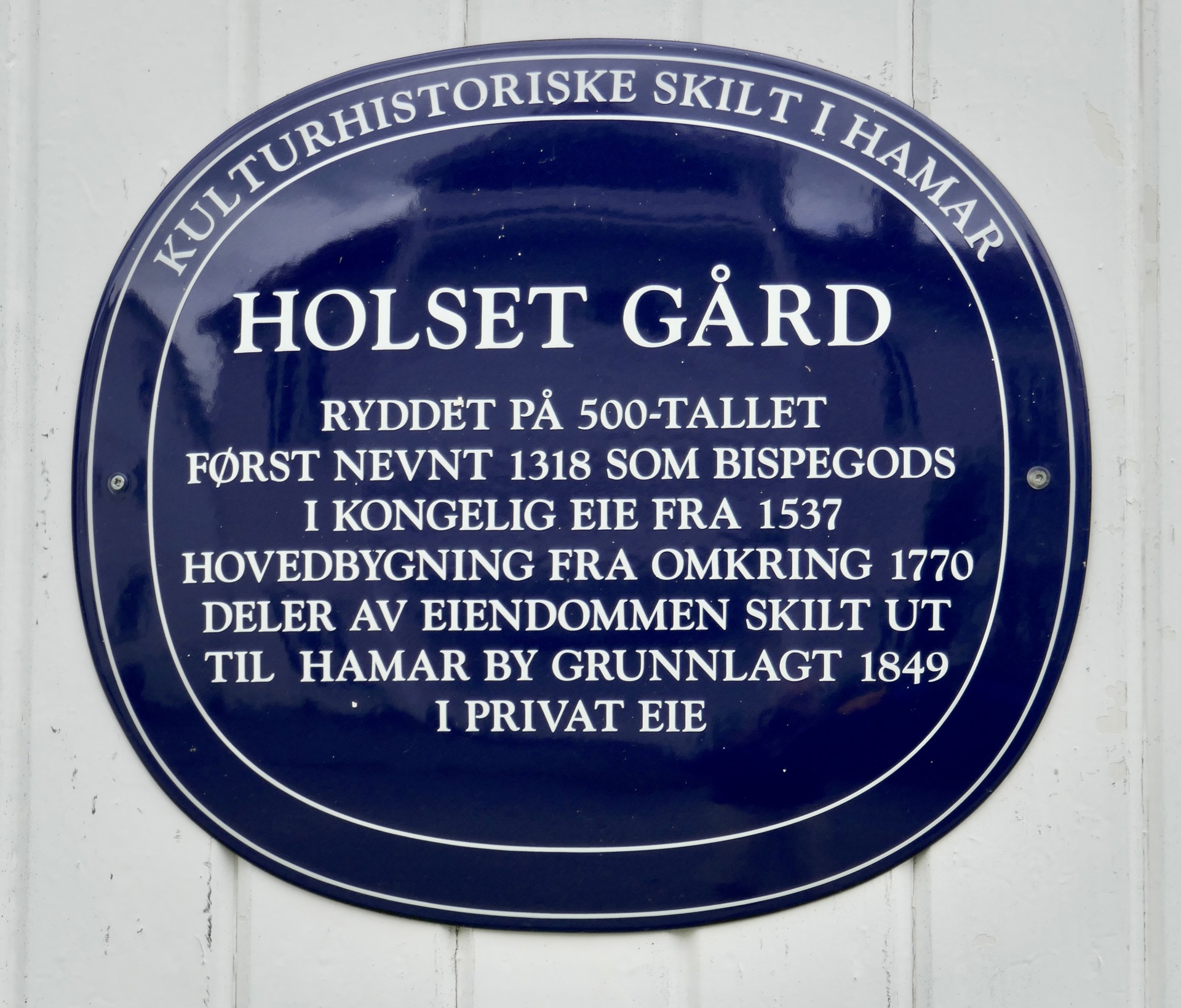 Blå skilt Holset